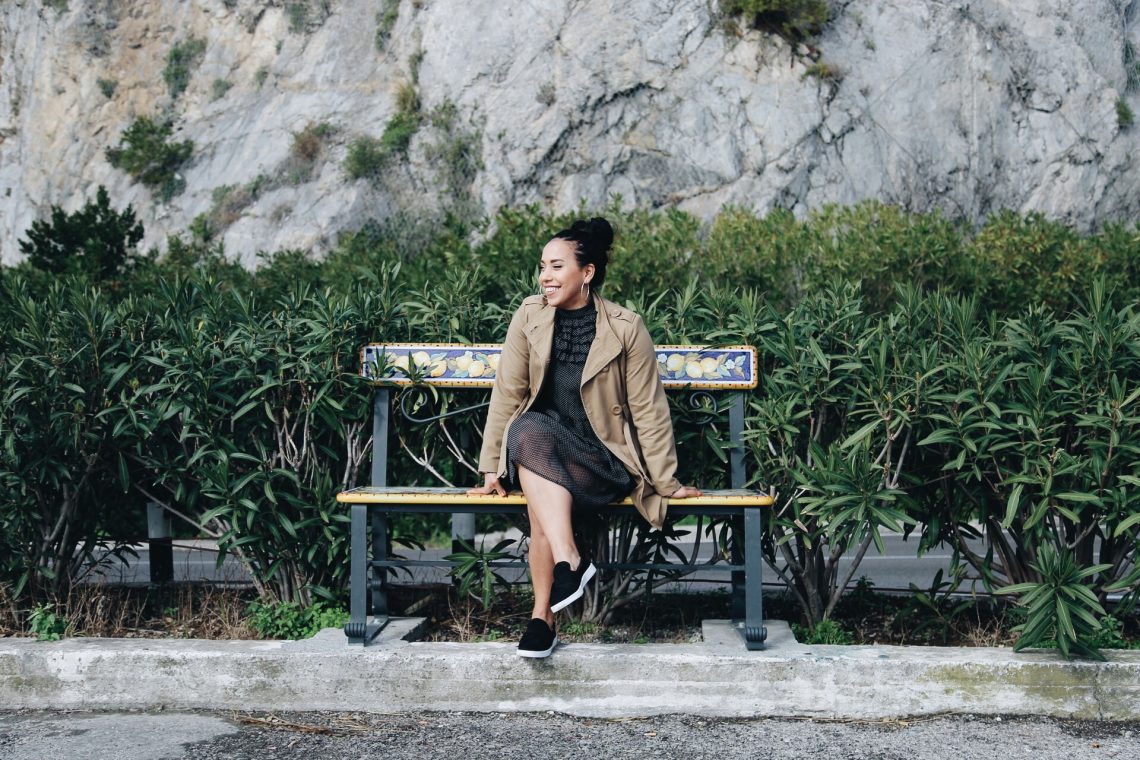 Yaritza Betancourt on bench of the coast of Amalfi Coast