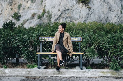 Yaritza Betancourt on bench of the coast of Amalfi Coast