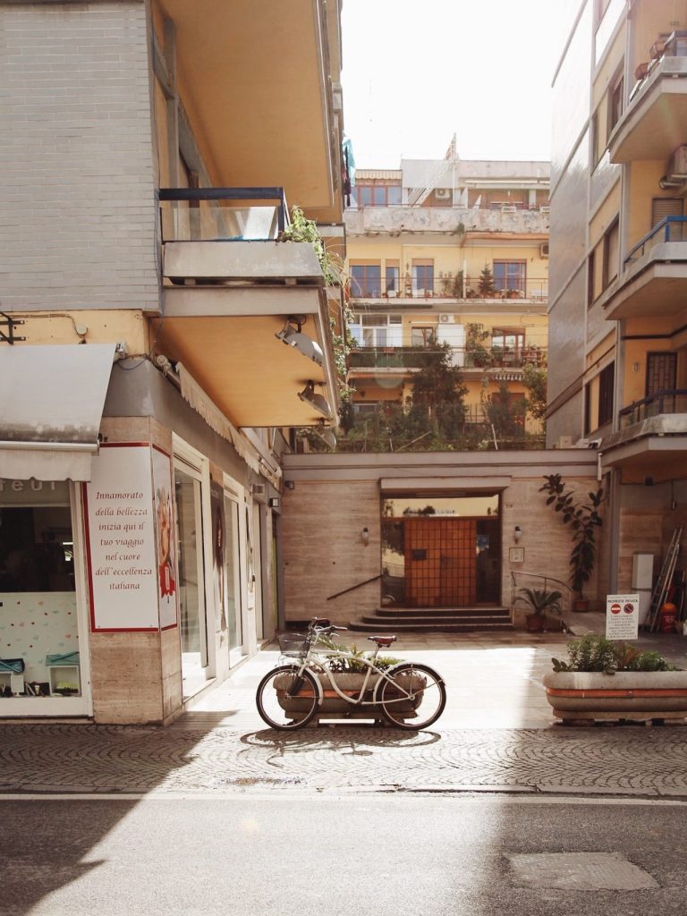 Bicycle on an empty sidewalk of Sorrento, Italy.